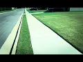 2 Lawns Next Door To One Another