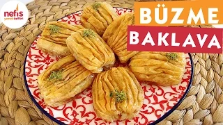 Cevizli büzme baklava tarifi Tepsimin büyüklügü 40 cm. Malzemeler hamuru için gerekenler 1 çay barda. 