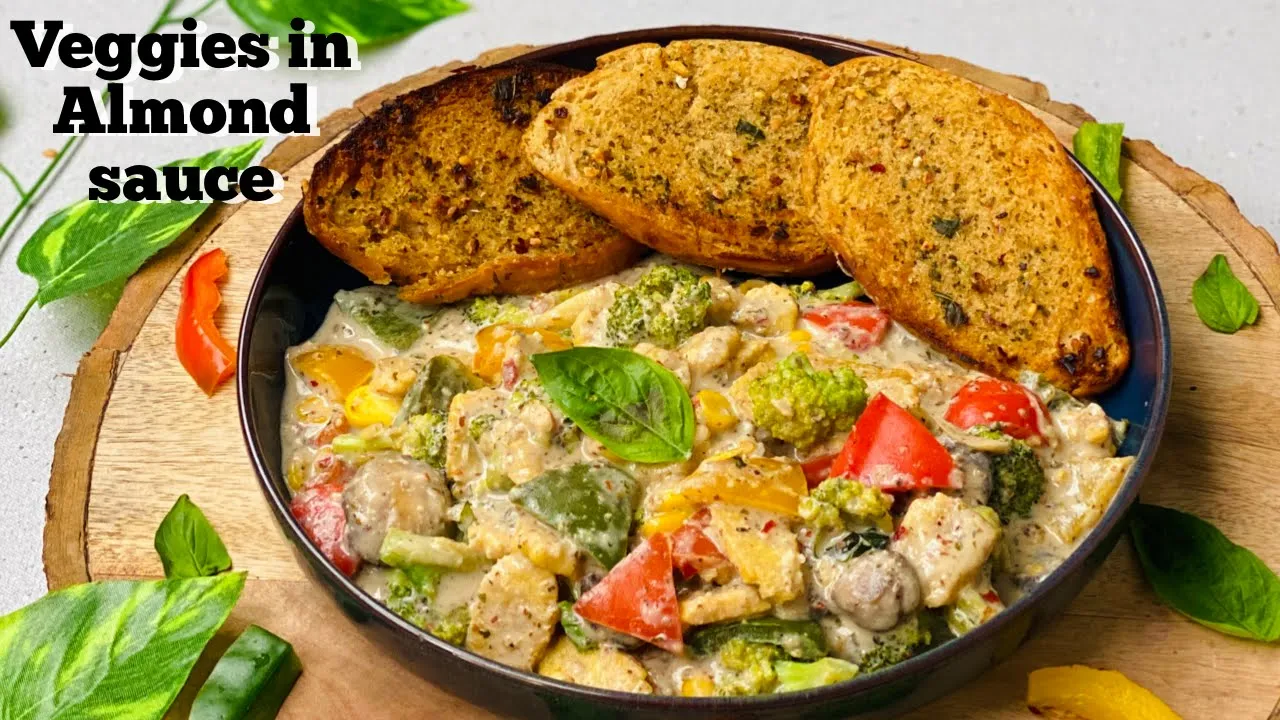 Creamy Veggies in Almond Sauce with Garlic Bread    Flavourful Food By Priya