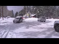 Snow and high winds knock down trees across Big Bear as crews clear roads