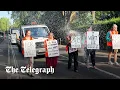 Download Lagu Just Stop Oil protesters soaked as water is thrown on them