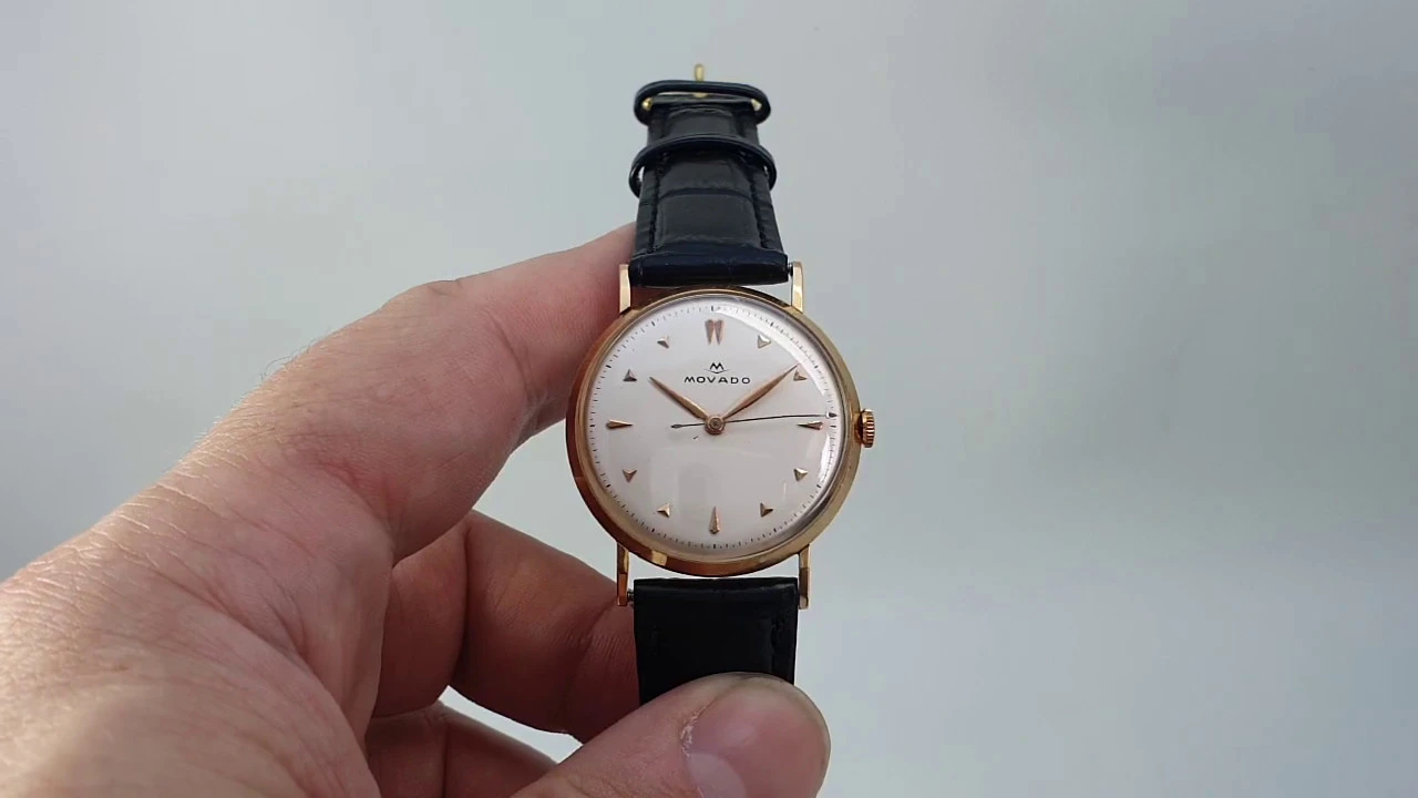 10.Movado Red Label Automatic Black Dial Mens Watch 0606112 US: https://amzn.to/3369kan UK: https://. 