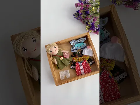 Small fabric doll with clothing