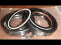 Adjusting Oil Seal tightness to stop leaks on rotating shafts after dressing out pitting or grooves
