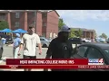 Parents volunteers working to move college students in under sweltering sun