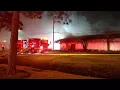 Firefighters battle warehouse fire