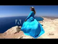 Lagu Woman in a blue dress in the wind