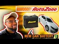 CARL S GARAGE GETTING A NEW BATTERY