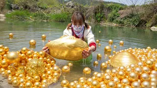 While exploring the stream, she pried open a huge clam and uncovered stunning precious pearls inside