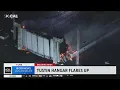 Tustin hangar fire flares up again