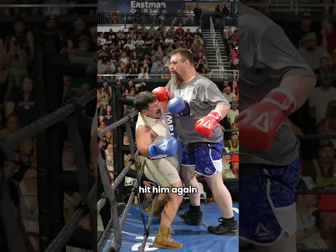 Short guy tries fighting a literal GIANT