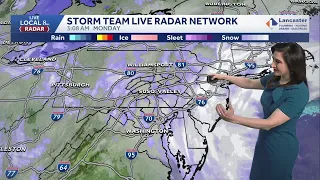 Snow tapers winds increase Monday