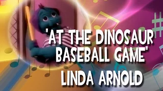 At The Dinosaur Baseball Game - Linda Arnold