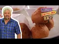 Guy Devours Bobby the Butcher s Chili Cheese Corn Holes Diners Drive-Ins and Dives Food Network