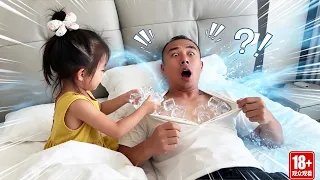 The daughter put ice cubes in her father's arms while he was asleep; how mischievous!