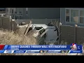 Driver slides off Mountain View Corridor crashes through fence and rolls into backyard
