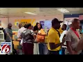 First state-chartered flight carrying Floridians from Haiti to arrive at Orlando-Sanford Interna