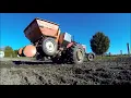 Vintage potato planter and harvester in action