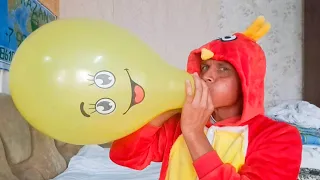 They blew up a green pirate balloon and it burst.