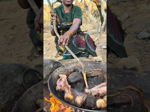 What is she cooking? 😳🔥 You won’t guess what’s on today’s traditional Hadzabe menu! 🌿🍽️