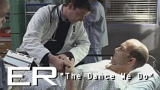 mark has a seizure and tells carter about his brain tumor er