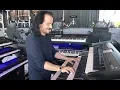 Yanni shows off his keyboards at soundcheck with a surprise