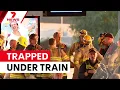 Schoolboy trapped under train after bag caught on mirror 7NEWS