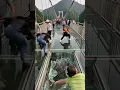 Download Lagu Glass bridge cracks and collapses.
