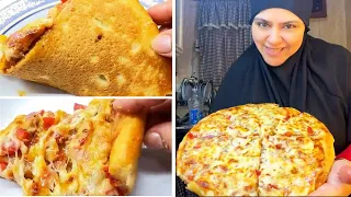 بيتزا افخم المحلات في 10 دقايق تعالي لو بتلزق منك وتطلع ناشفة هقولك الغلطة فين 