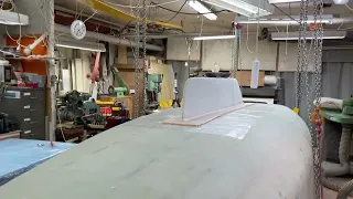 Getting the flange and keel pattern together. Gluing and fillets. The result not excactly straight.