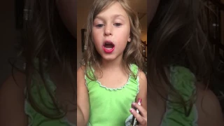 little girl does lipsense demo