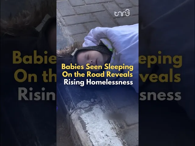 ⁣A baby is seen sleeping in the chilly cold on the road in Gaza. Over 1.8 million have been displaced