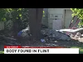 Flint Police launch investigation after body was found