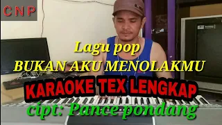 Cover lagu BUKAN AKU MENOLAKMU.