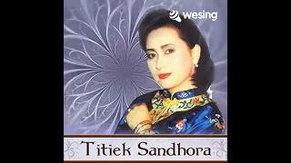 Download Cover : Putus Cinta di Batas Kota by Titiek Sandora MP3