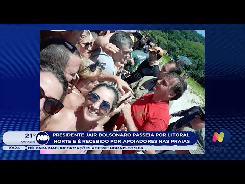 Bolsonaro é recebido por apoiadores durante passeio em praias do Litoral Norte