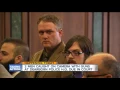 2 men caught on camera with guns at Dearborn police headquarters due in court