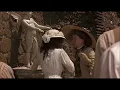 Georgina Cates drinking from the fountain - Stiff Upper Lips 1997