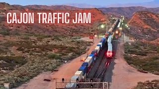 TRAINS OVER MASSIVE MOUNTAIN PASS - Cajon Trains STOPPED MEETS BNSF GEOMETRY CAR AMTRAK