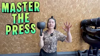 How to Do the Bottoms-Up Kettlebell Press Build Shoulder Stability Grip Strength