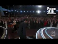 Watch Adrien Brody spit out gum toss it to girlfriend Georgina Chapman before accepting Oscar