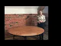 Measuring a round table for a Wipe Easy Tablecloth