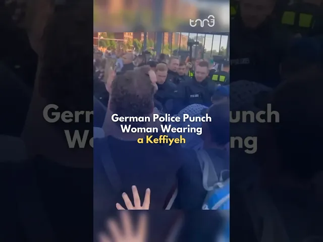 At a pro-Palestine protest, German police punched a woman who was wearing a keffiyeh. #news #reels