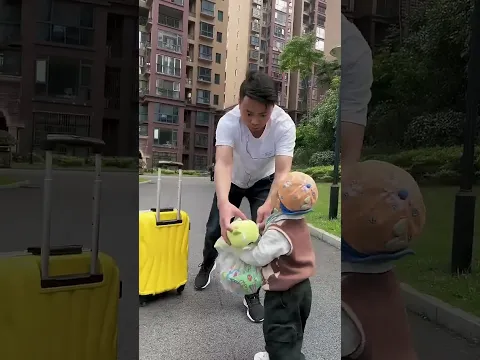 Stay at home dad returns from trip and meets long absent son