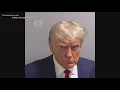 Mug shot of Donald Trump during speedy booking at Atlanta jail shows scowling former president
