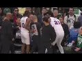 Joel Embiid fighting with Celtics assistant coach for the ball in Game 7