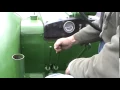 Starting a 1958 John Deere 820 two cylinder diesel tractor