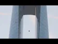 Lagu Skydiver flies through narrow opening in Dubai hotel