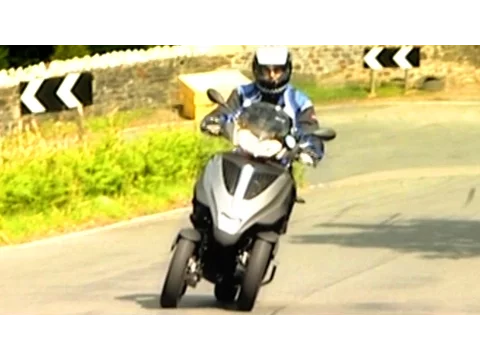 Download MP3 Taking On The Isle Of Man TT On A 3 Wheeled Scooter #TBT - Fifth Gear
