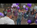 Community holds vigil for mother found dead in apartment